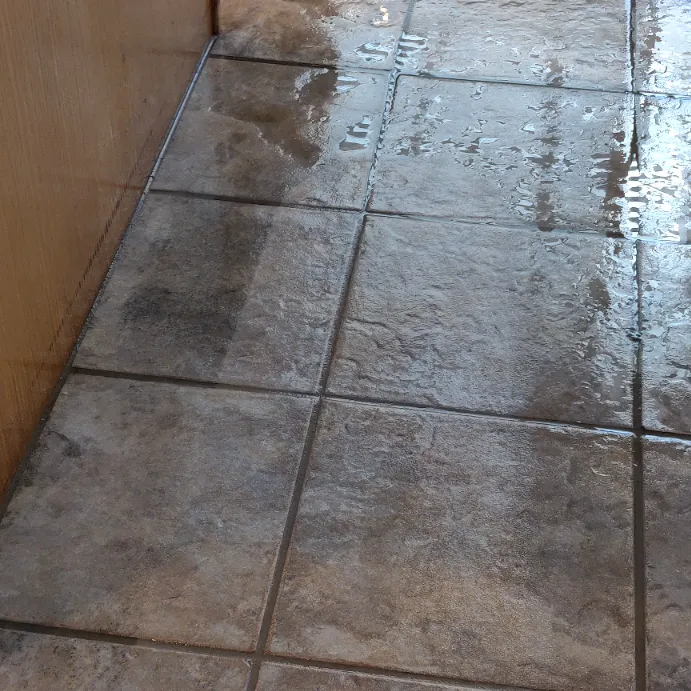 Removing tough hard water stains and grime from tile floors in Jurupa Valley