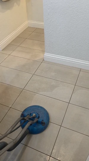 Tile & Grout Cleaning in Corona 8 High-pressure tile cleaning machine showing an immediate contrast between clean and dirty tile floor