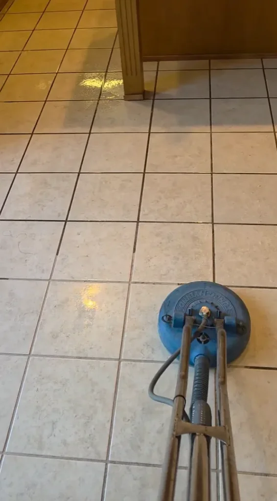Tile & Grout Cleaning in Corona 7 Professional hard surface spinner tool cleaning a large kitchen tile floor area in Corona
