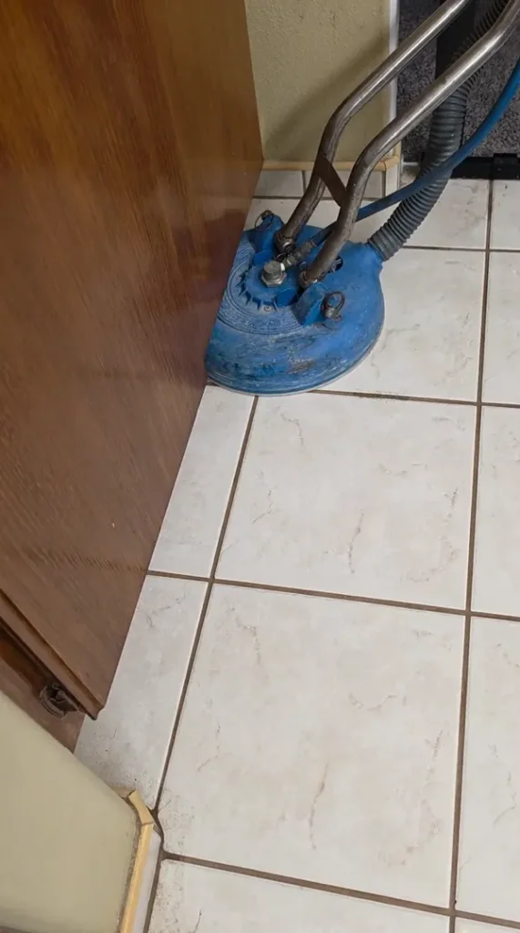 Advanced rotary surface spinner machine flushing out dirt from tile lines in a Lake Elsinore home