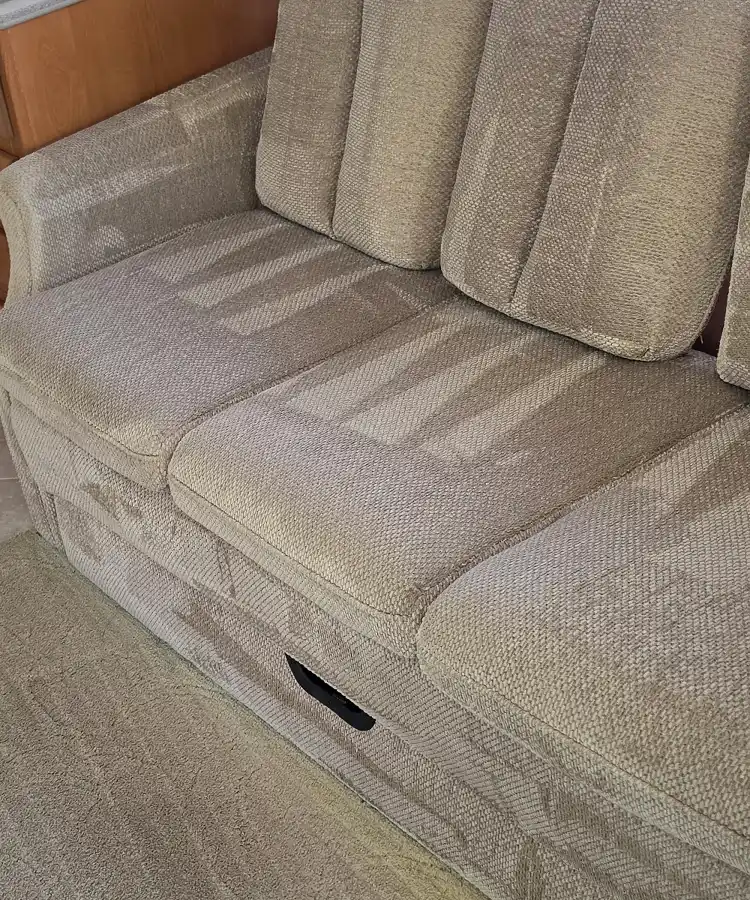 Upholstery Cleaning in Menifee 7 Deep extraction steam patterns showing professional upholstery cleaning in menifee on a textured fabric couch